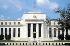 Federal Reserve ends bond buying; says US economy recovering